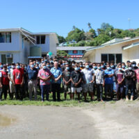 The 94 workers who will be leaving the Solomon Islands to work in Australia. Here they share a moment with officials from the Ministry of Foreign Affairs and External Trade and the Australian High Commission in Honiara.