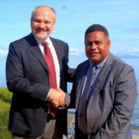MNPDC Minister Hon Rexon Ramofafia (right) welcomes MCC Threshold Program Director in Solomon Islands, Charles Jakosa during his recent trip to Solomon Islands