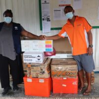 WHO Epidemiologist and COVID-19 Preparedness and Response Officer, Dr. Stephanie Fletcher-Lartey handover the IPC, ICT and PPEs items to Lata Hospital Supervising Director Dr Paul Kekou.