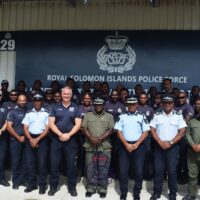 1 Group photos in front of the Tactical Training Centre