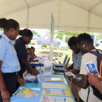 IMG_1386 Some members of the Public and students from the Solomon Islands National University (SINU) accessing Customs Information Booth during the National Trade Fair 2026.