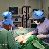 Dr. Jahrad, NRH Surgeon, performing modified radical mastectomy for right-sided breast cancer under the guidance of Dr. Zhang Shiyong