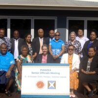 Delegates of the PIANZEA Senior Officials Meeting gather in front of the Heritage Park Hotel Conference Room, Honiara, Solomon Islands. Delegates of the PIANZEA Senior Officials Meeting gather in front of the Heritage Park Hotel Conference Room, Honiara, Solomon Islands.